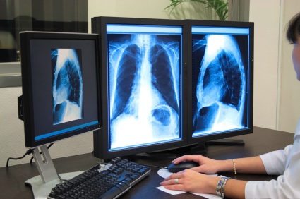 Examining Xrays after a comprehensive physical examination